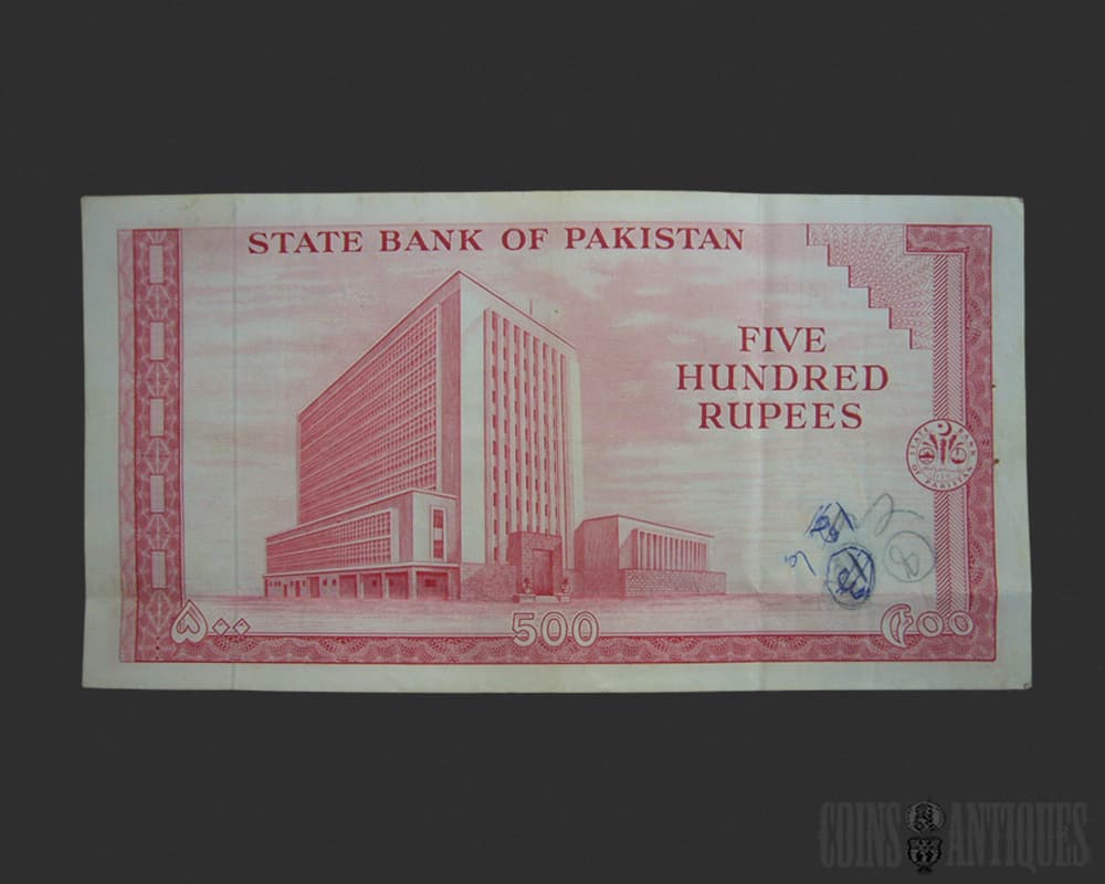 Pakistani 500-rupee banknote with State Bank of Pakistan building illustration at center. It is red and features the denomination 500.